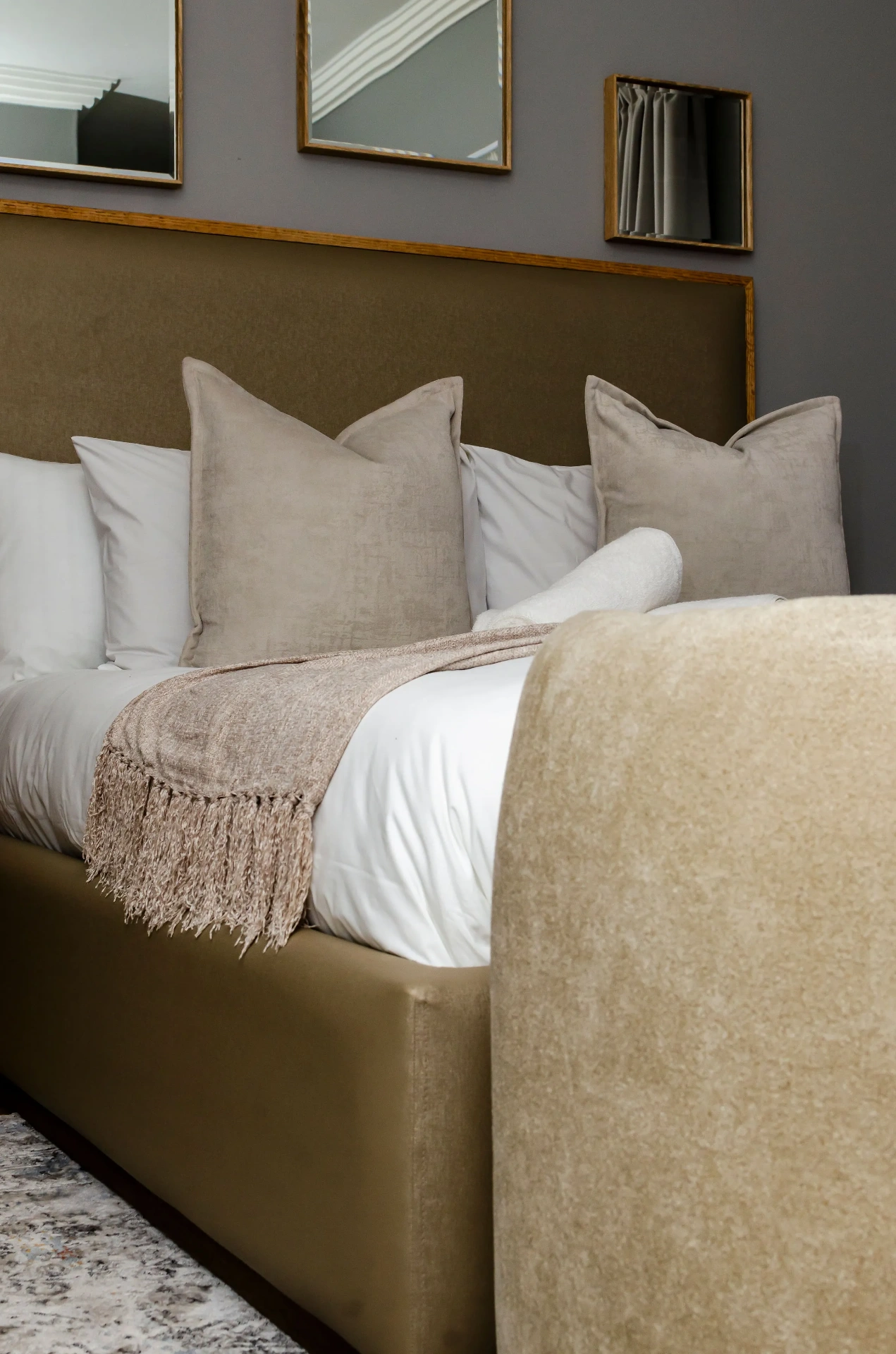 The Horizon Room — upholstered headboard detail