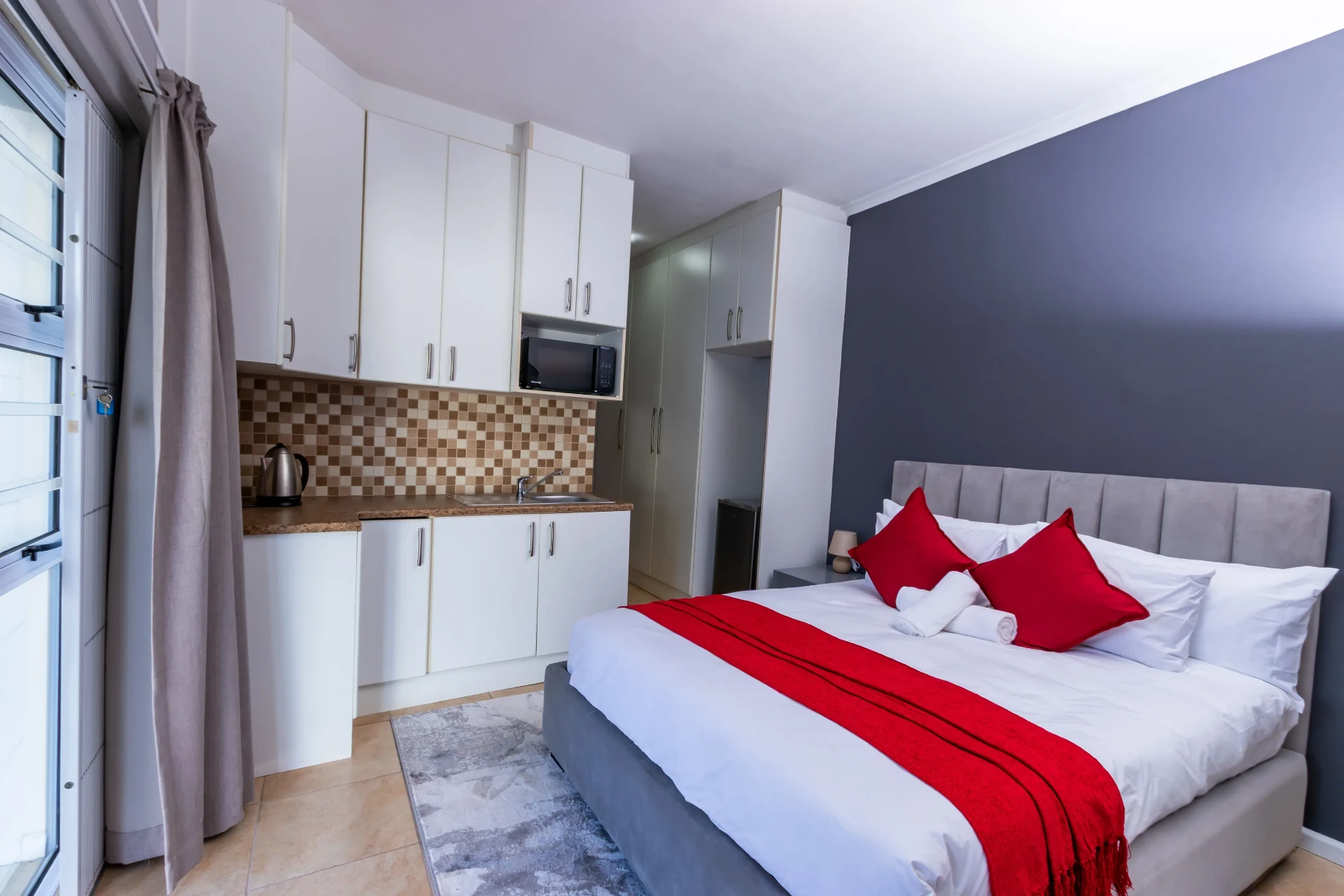 The Serenity Room — bedroom and private kitchenette