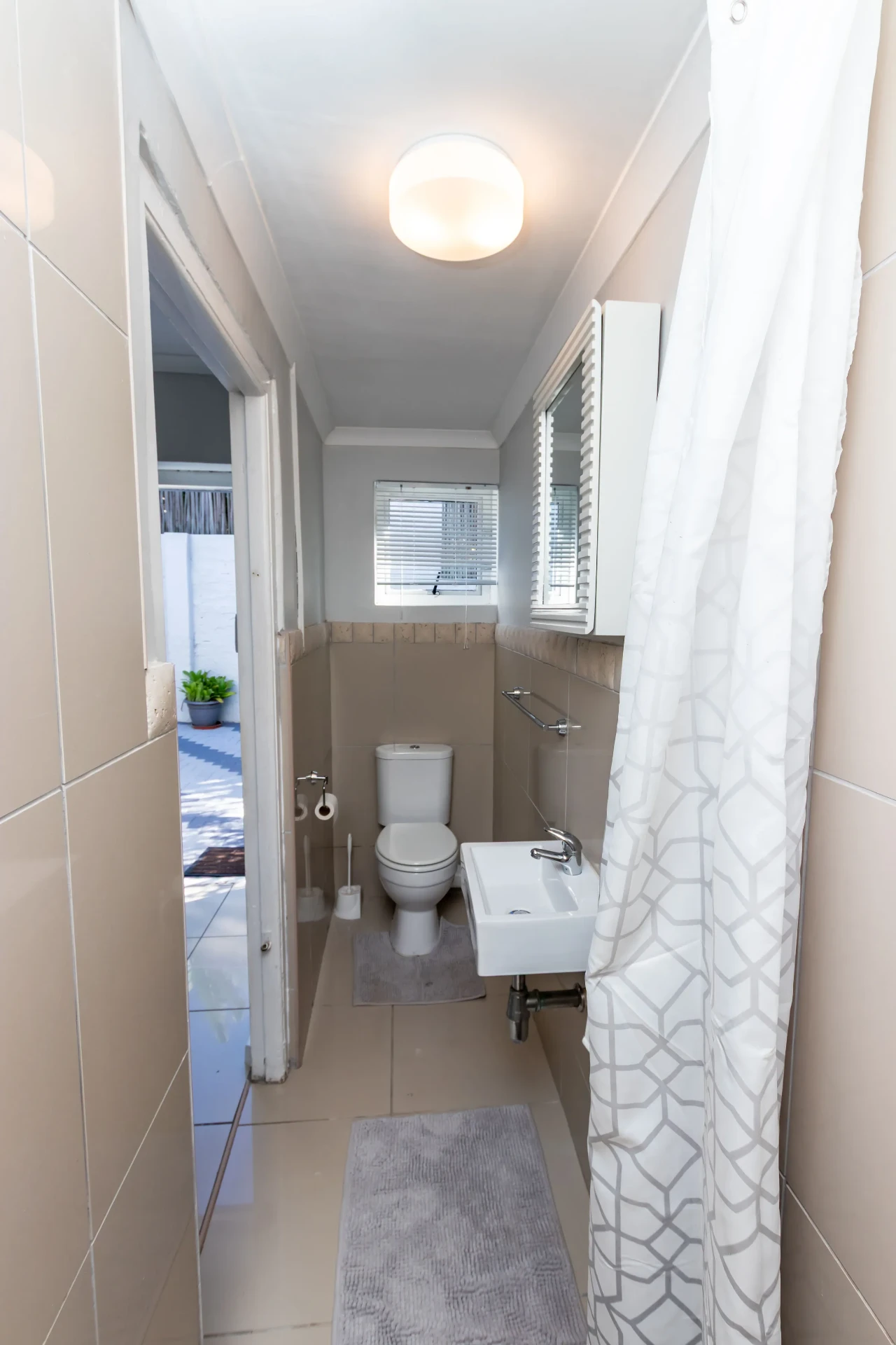 The Signature Room — en-suite opening to the courtyard