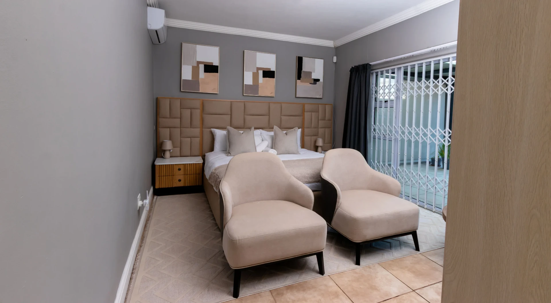 Presidential Suite — king bed and seating