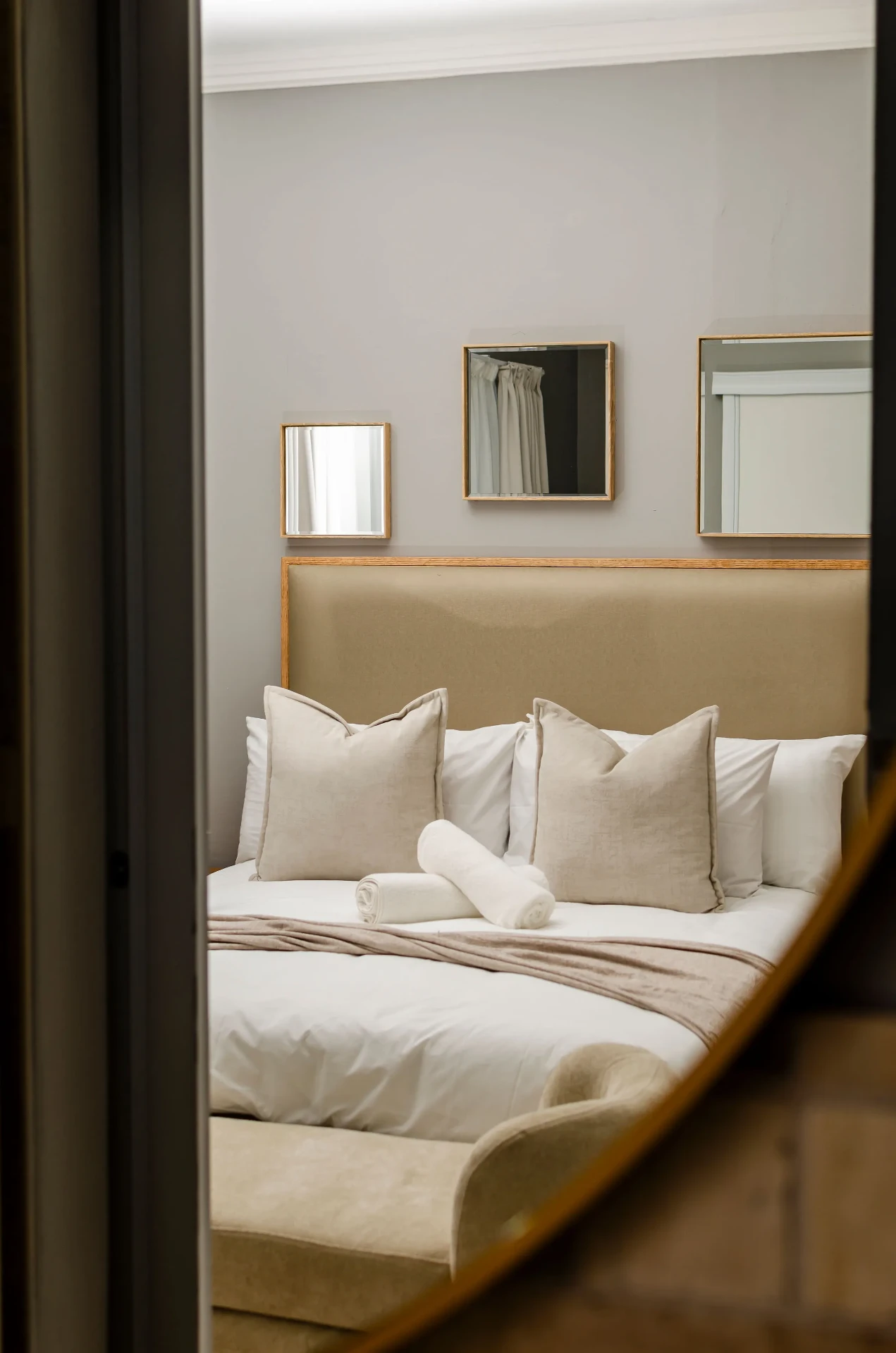 The Horizon Room — soft bedroom view through doorway