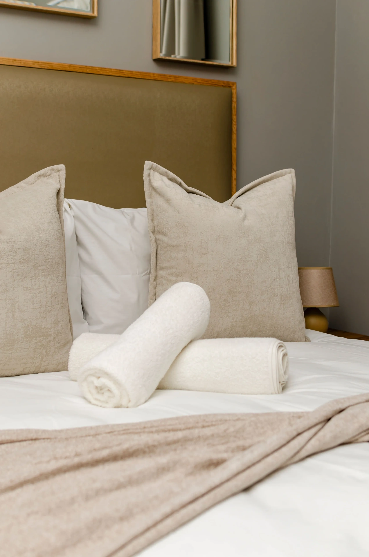 The Horizon Room — plush bedding and styled cushions