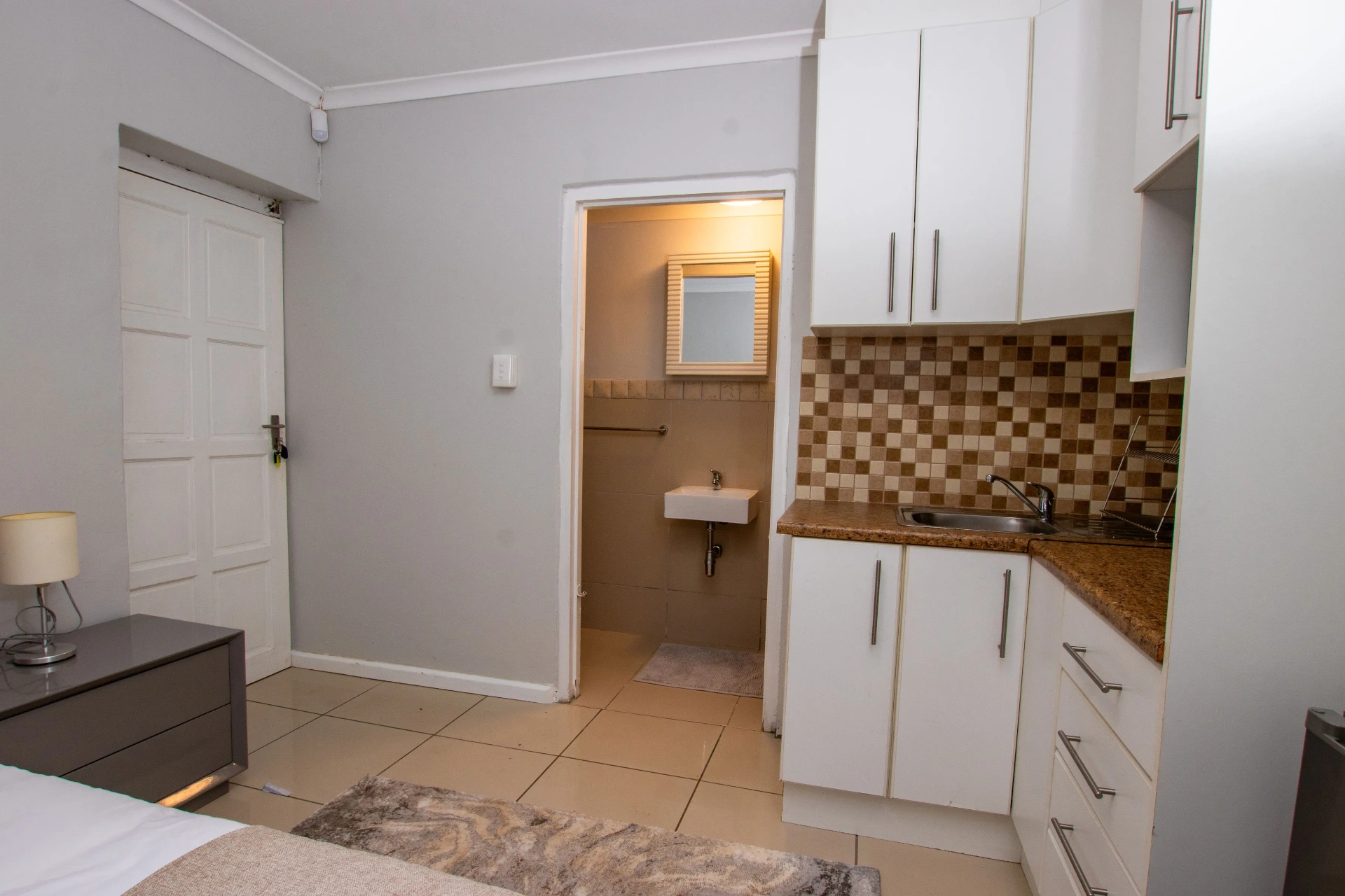 The Signature Room — entry, kitchenette and en-suite